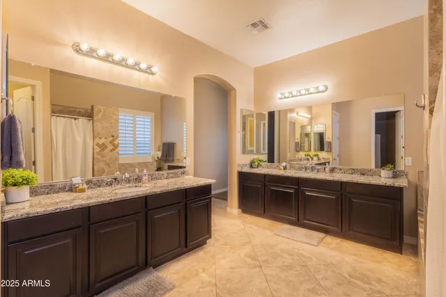 a view of a swimming pool and lounge chair