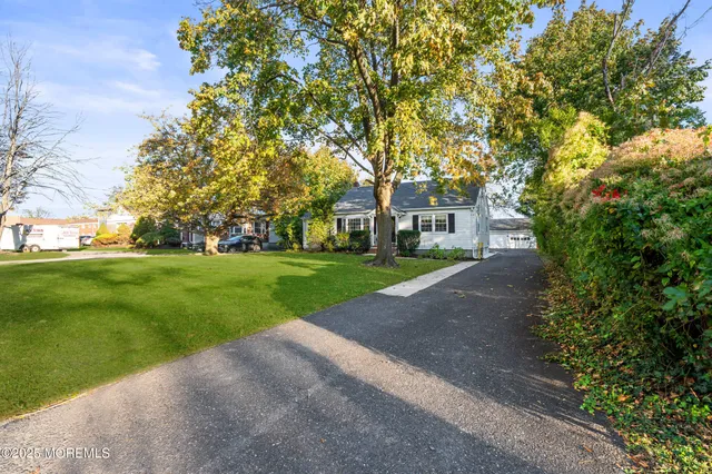 a house with huge green field