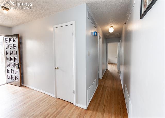 Entryway with wood floors