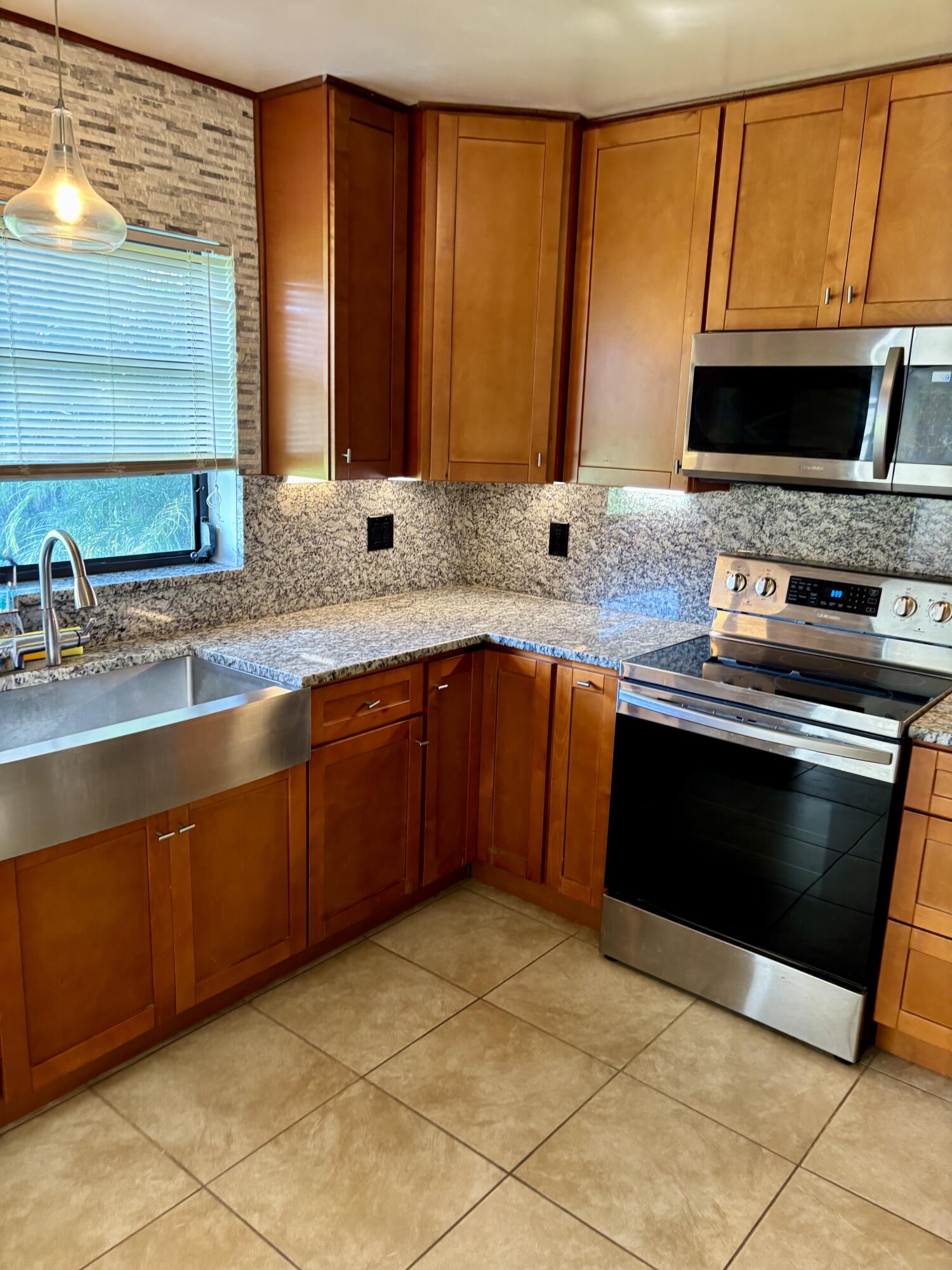 4916 Eaglewood Road, Unit A Boynton Beach, FL 33436 - Photo 3 of 35 IMG_9999
