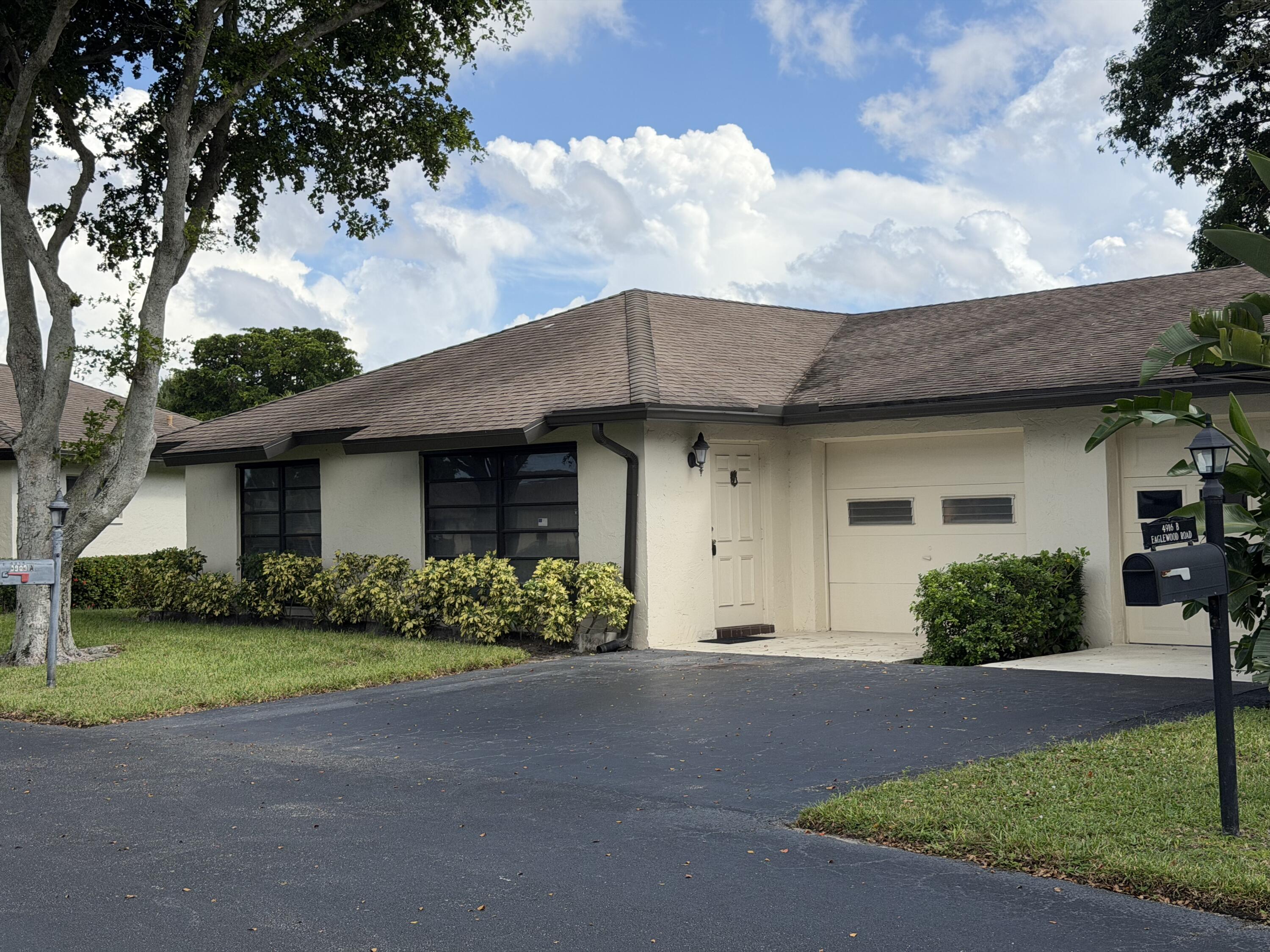 4916 Eaglewood Road, Unit A Boynton Beach, FL 33436 - Photo 32 of 35 Villa Front
