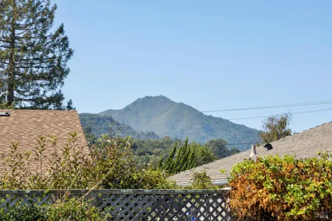 a kitchen with stainless steel appliances granite countertop sink stove and cabinets