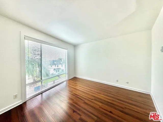 a bathroom with a sink a mirror and a shower