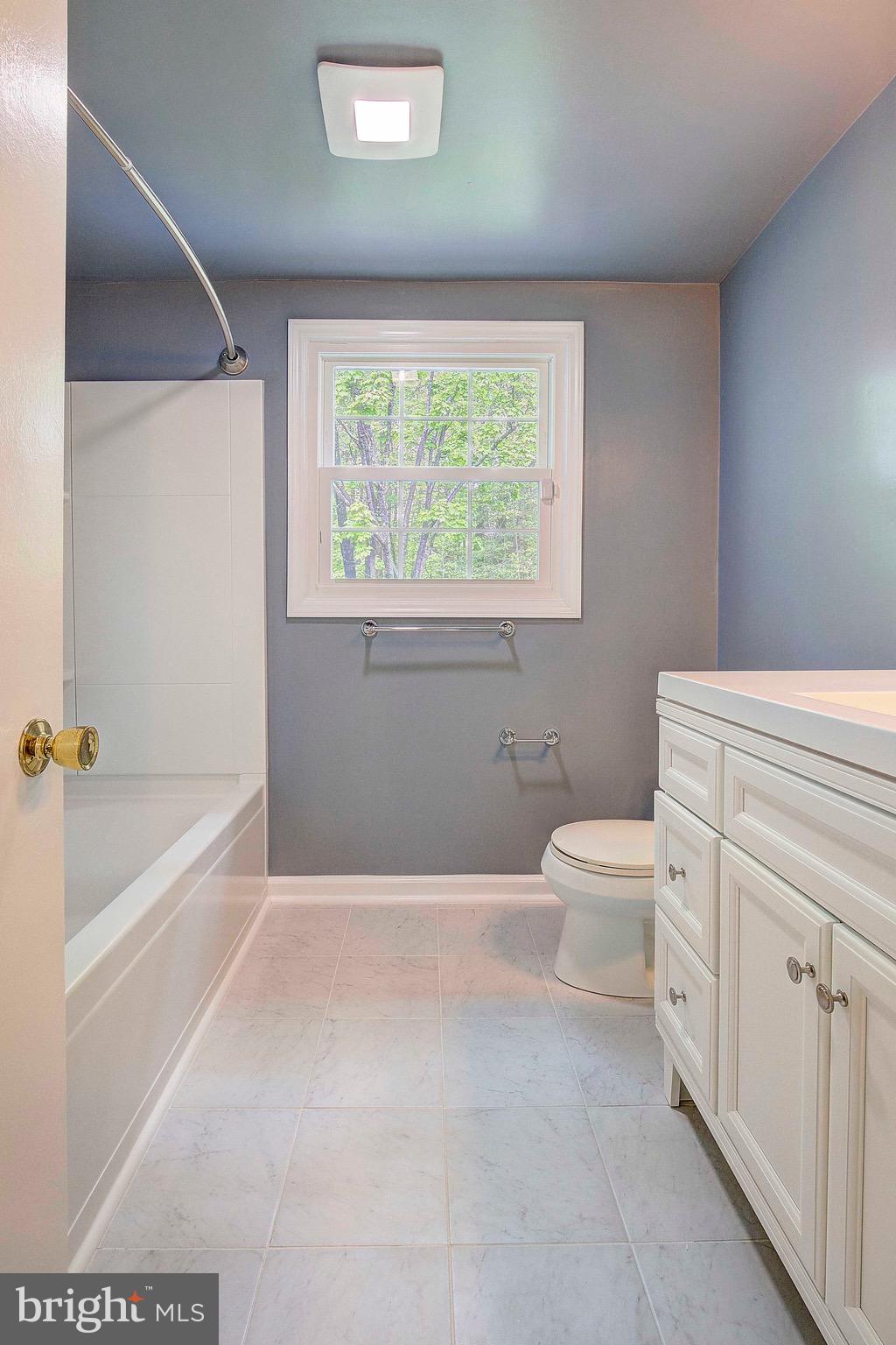 8705 Crestmont Lane Laurel, MD 20708 - Photo 21 of 31 Upstairs renovated hall bathroom