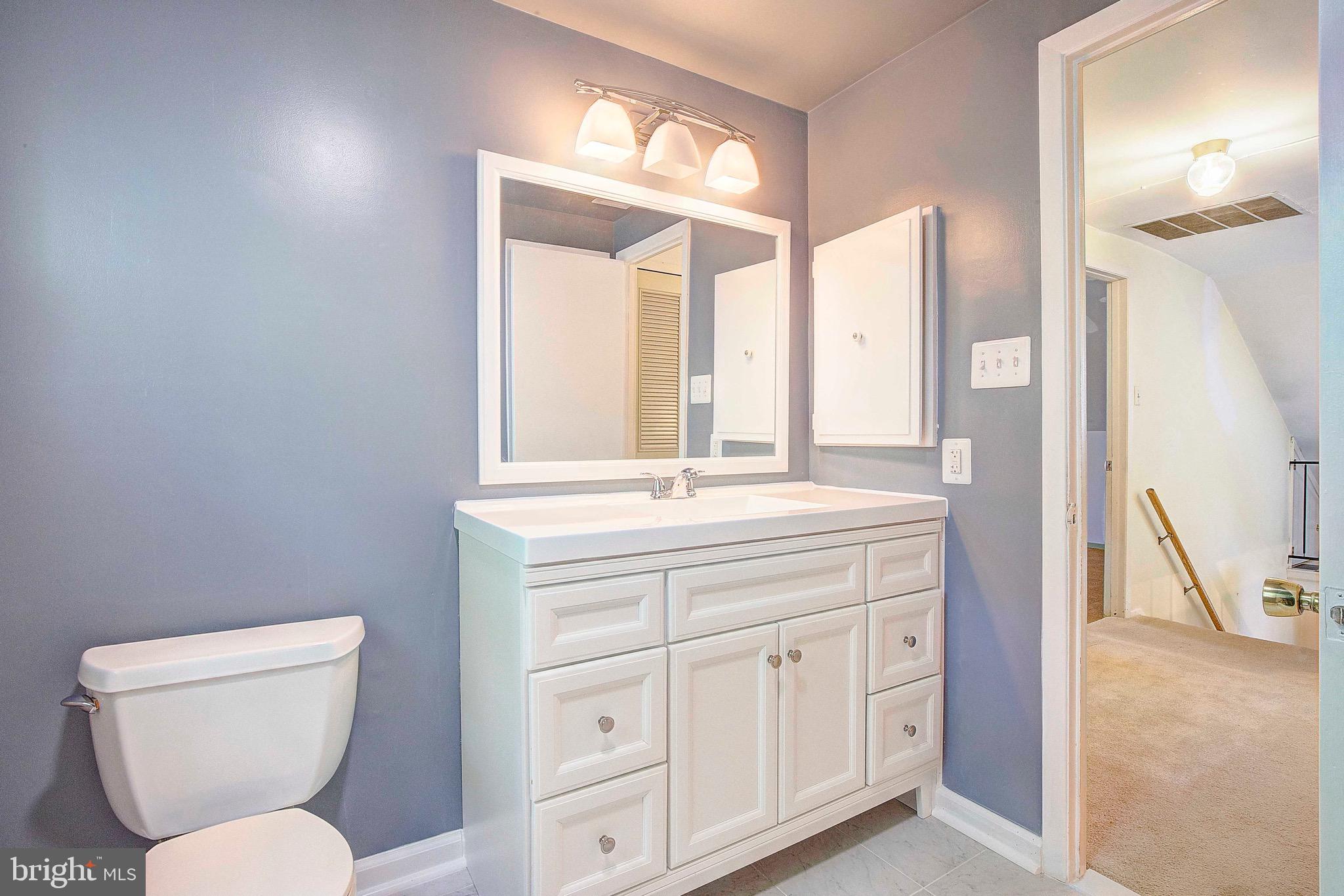 8705 Crestmont Lane Laurel, MD 20708 - Photo 5 of 31 Upstairs renovated hall bathroom