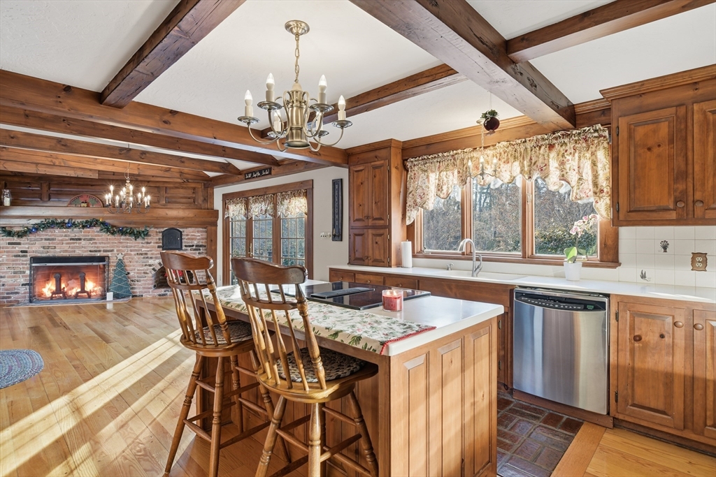 4 Thayer Road Monson, MA 01057 - Photo 13 of 40 a dining table with chairs and chandelier