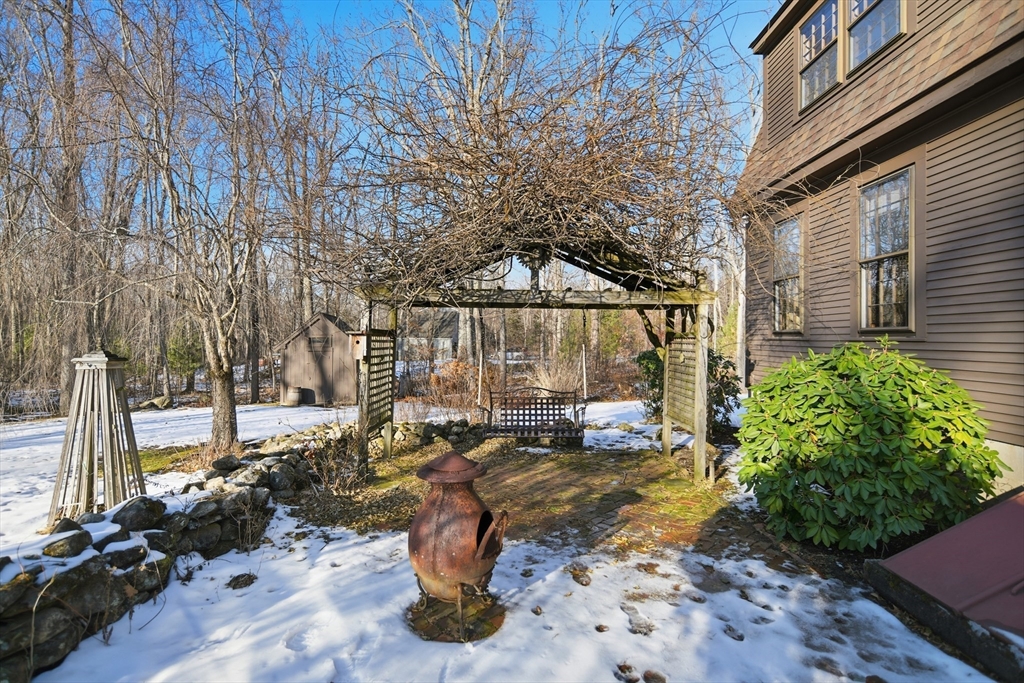 4 Thayer Road Monson, MA 01057 - Photo 31 of 40 a view of a patio with table and chairs and potted plants