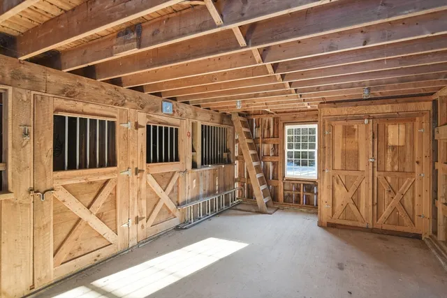 a view of an entryway with wooden walls