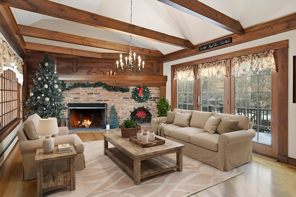 4 Thayer Road Monson, MA 01057 - Photo 5 of 40 a living room with furniture a fireplace and a large window