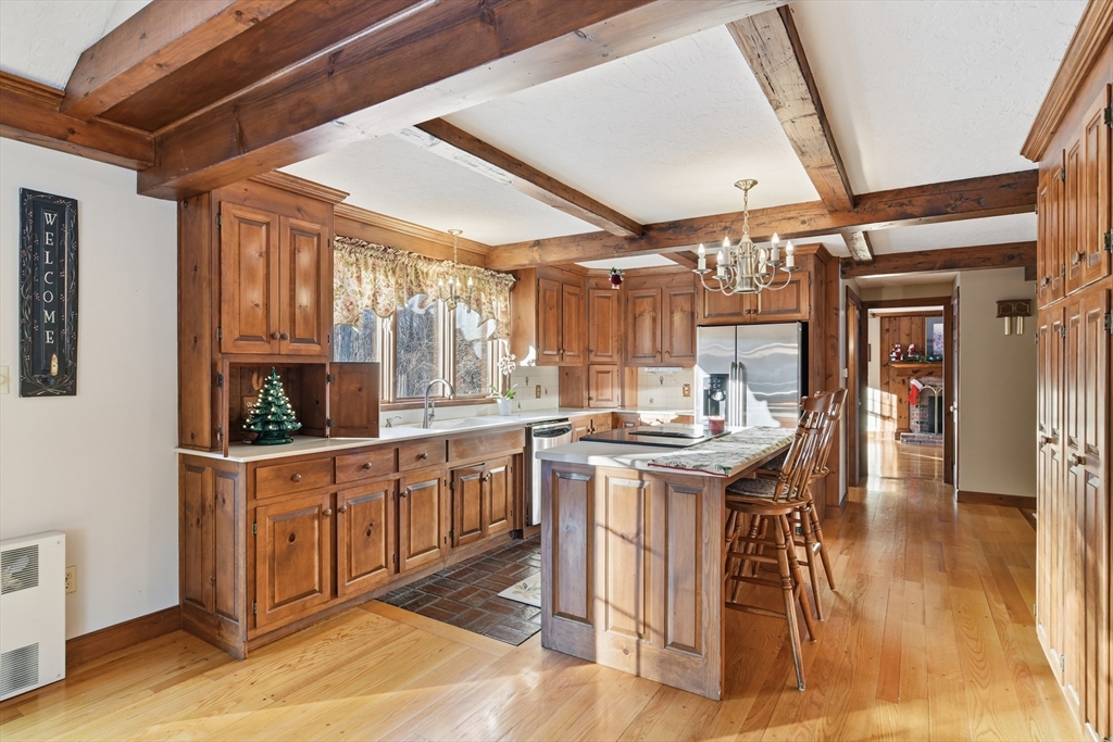 4 Thayer Road Monson, MA 01057 - Photo 9 of 40 a kitchen with stainless steel appliances granite countertop a stove and cabinets