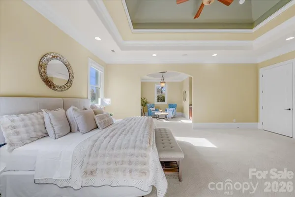 a bedroom with bed and window