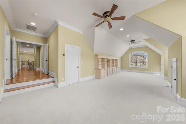 a view of a hallway with a glass door