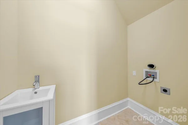 a bathroom with a sink and vanity
