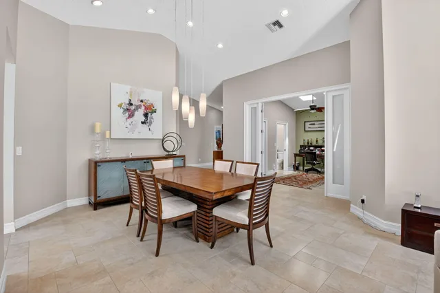 a kitchen with stainless steel appliances granite countertop cabinets and window