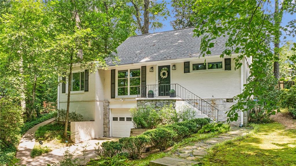 a house view with a garden space