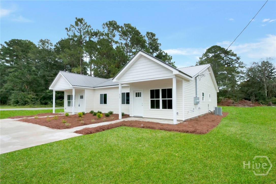 728 Talmadge Road, Unit A & B LOT 5 Allenhurst, GA 31301 - Photo 3 of 20 Representative photos shown. Images are from a previously completed home of the same floor plan. Actual home may vary. Home currently under construction. grass enhanced