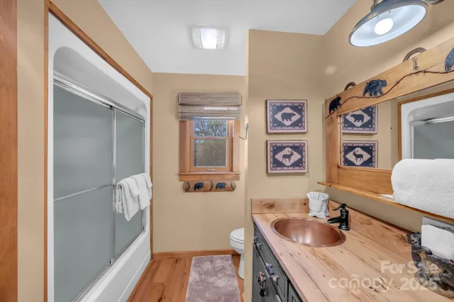 a media room with furniture a rug and a projector