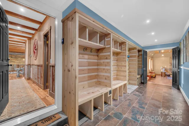 a view of gallery with wooden floor