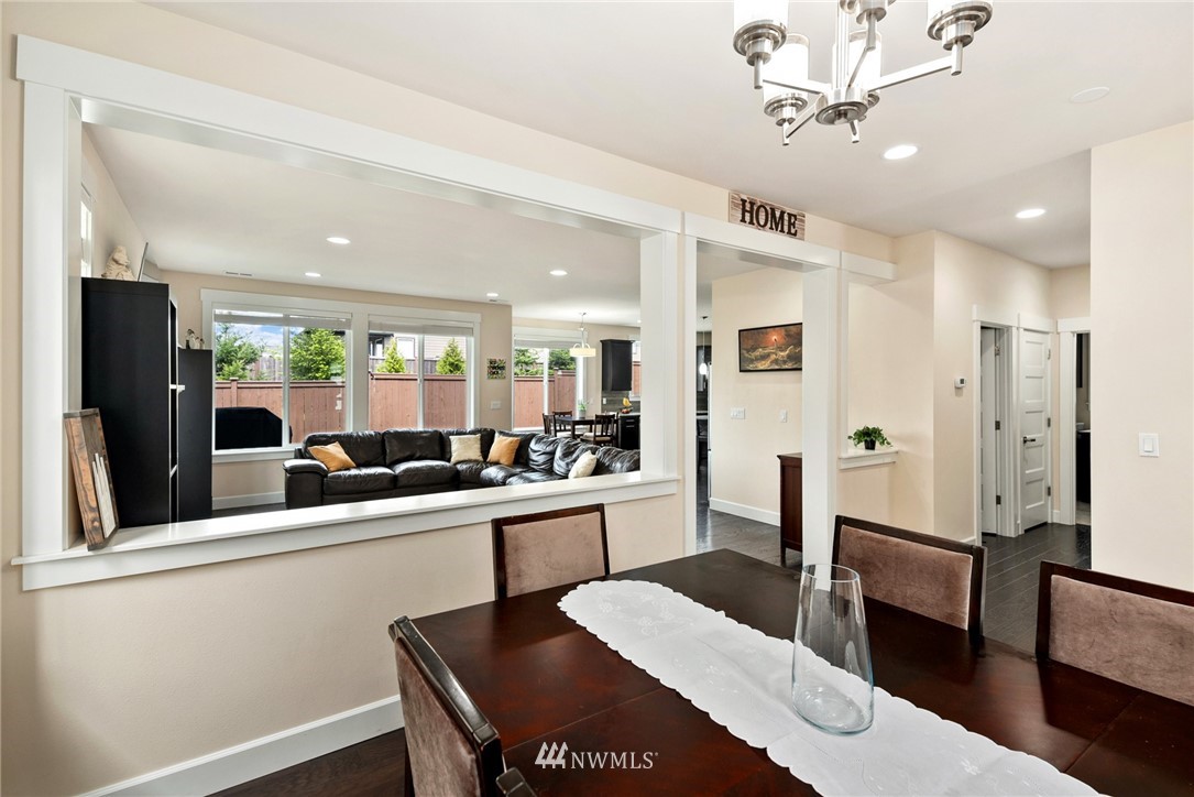 4113 172nd Place Southeast Bothell, WA 98012 - Photo 12 of 32 a large kitchen with a table and chairs
