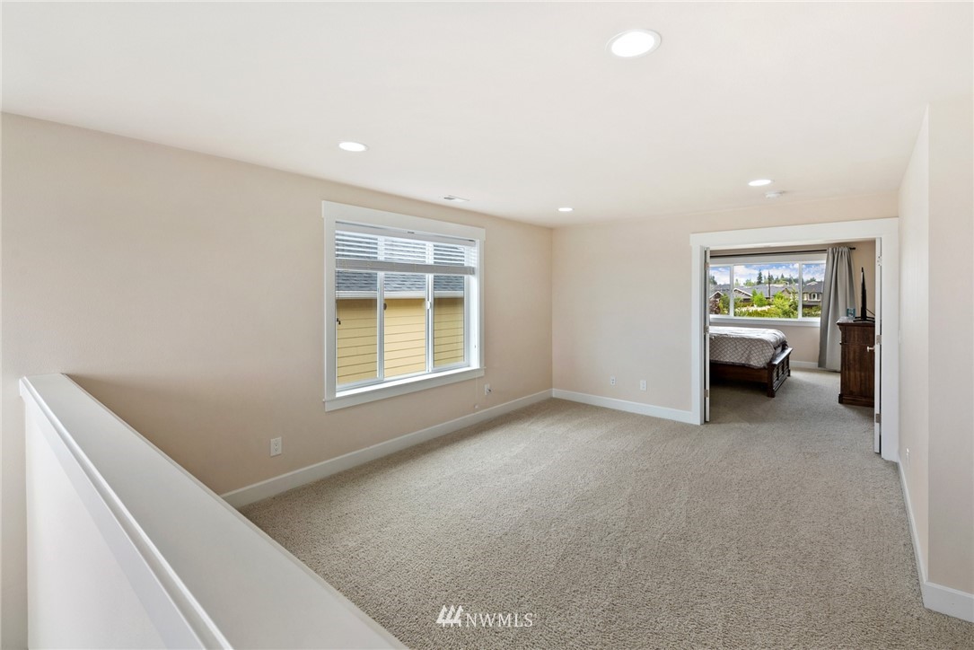 4113 172nd Place Southeast Bothell, WA 98012 - Photo 15 of 32 a view of livingroom with furniture and windows