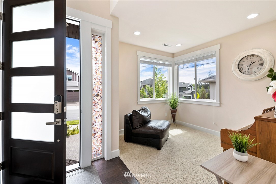 4113 172nd Place Southeast Bothell, WA 98012 - Photo 3 of 32 a living room with furniture and a window