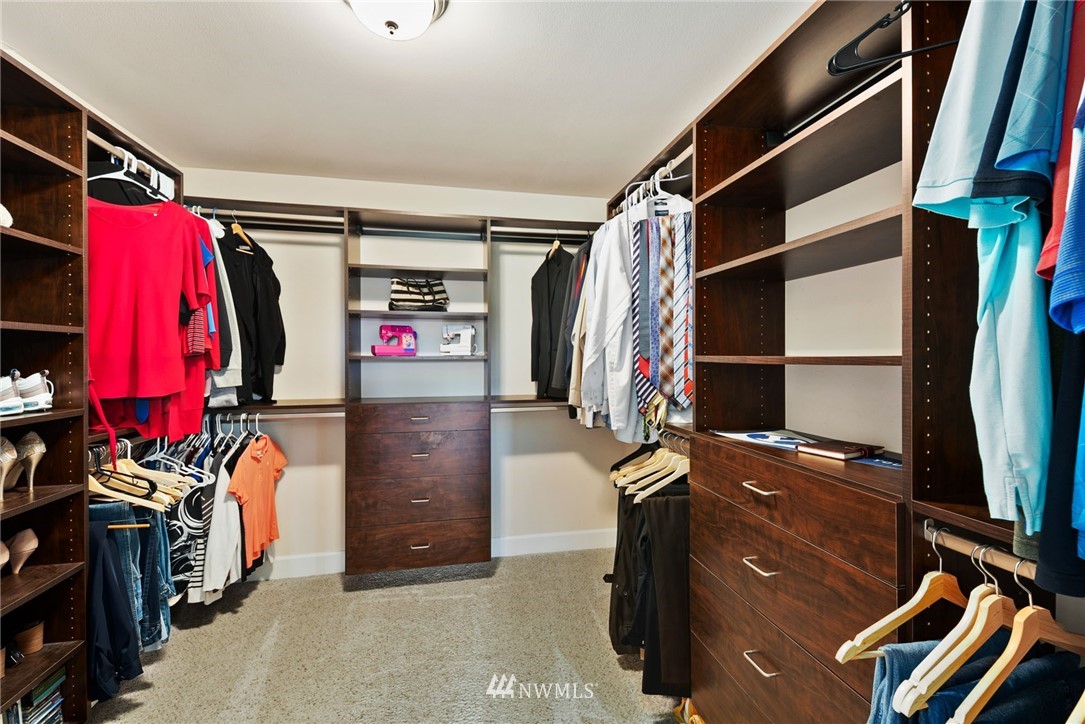4113 172nd Place Southeast Bothell, WA 98012 - Photo 21 of 32 a view of walk in closet with clothes