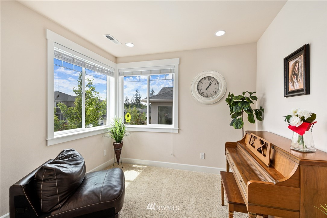 4113 172nd Place Southeast Bothell, WA 98012 - Photo 4 of 32 a living room with furniture and a window