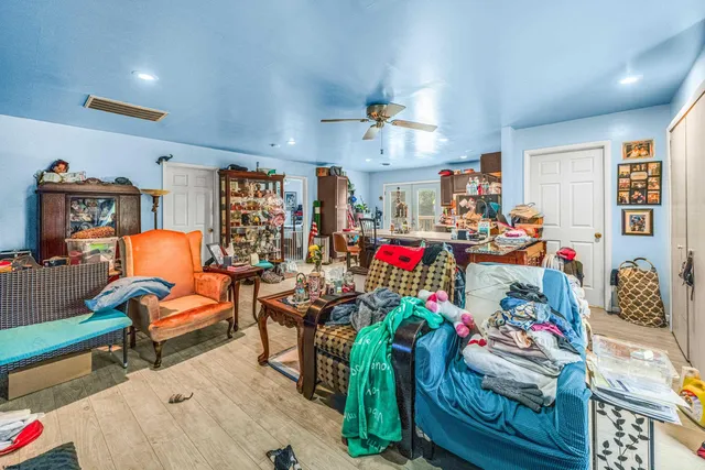 a living room filled with a furniture and toys