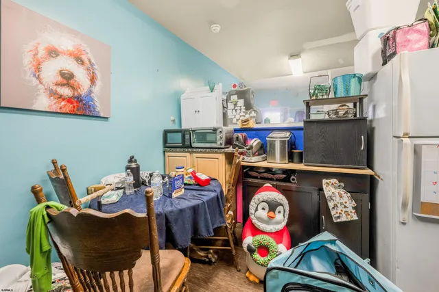 a living room filled with furniture and a fireplace