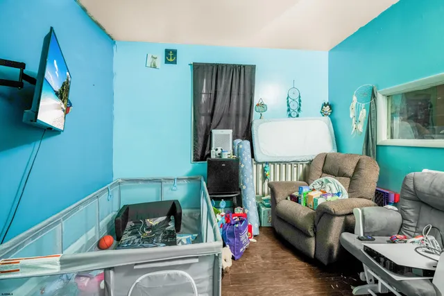 a view of storage and utility room with washer and dryer