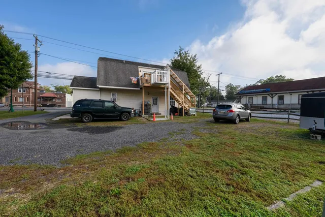 a view of a two chairs in the patio