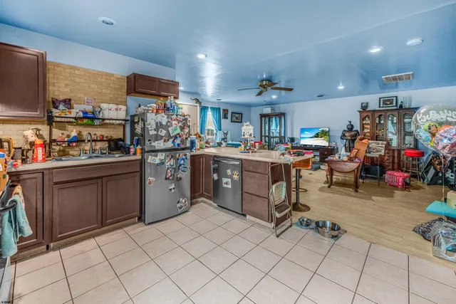 a kitchen with lots of appliances