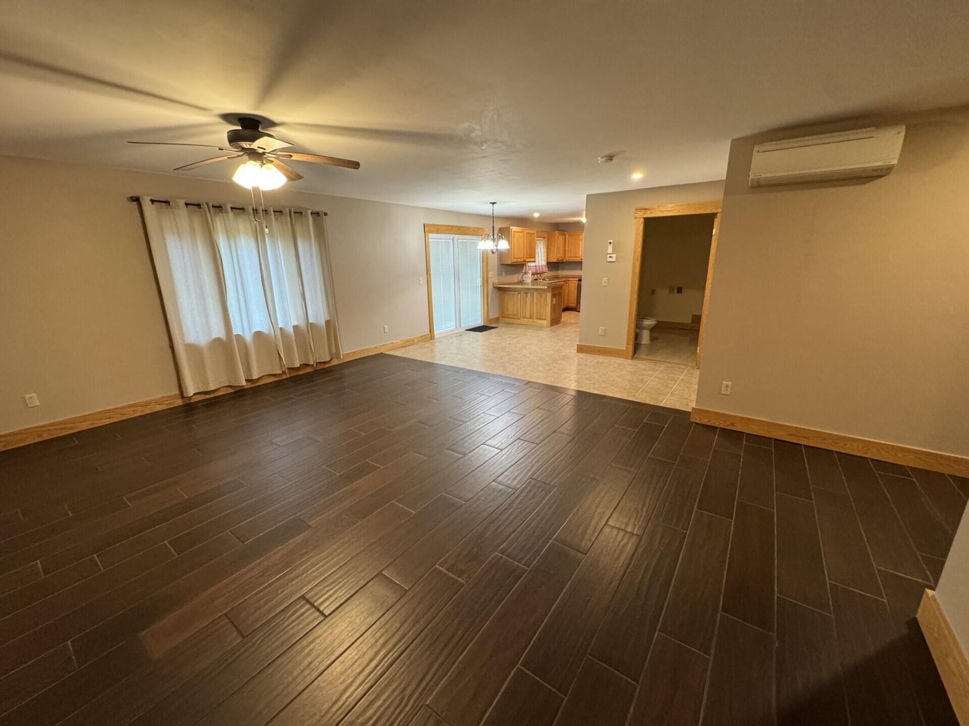 5 Chestnut Street Unity, ME 04988 - Photo 8 of 24 Living room to kitchen
