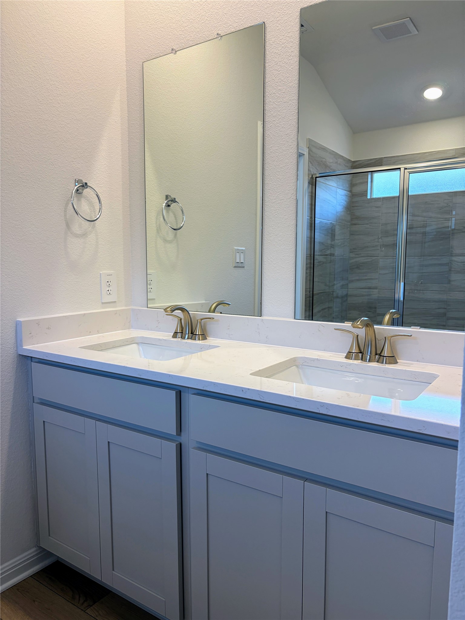 440 El Capitan Loop Dripping Springs, TX 78620 - Photo 12 of 22 Full bath featuring double vanity and a stall shower