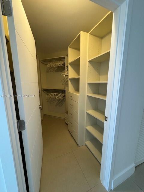 6301 Collins Avenue, Unit 1608 Miami Beach, FL 33141 - Photo 9 of 9 a view of walk in closet with empty racks