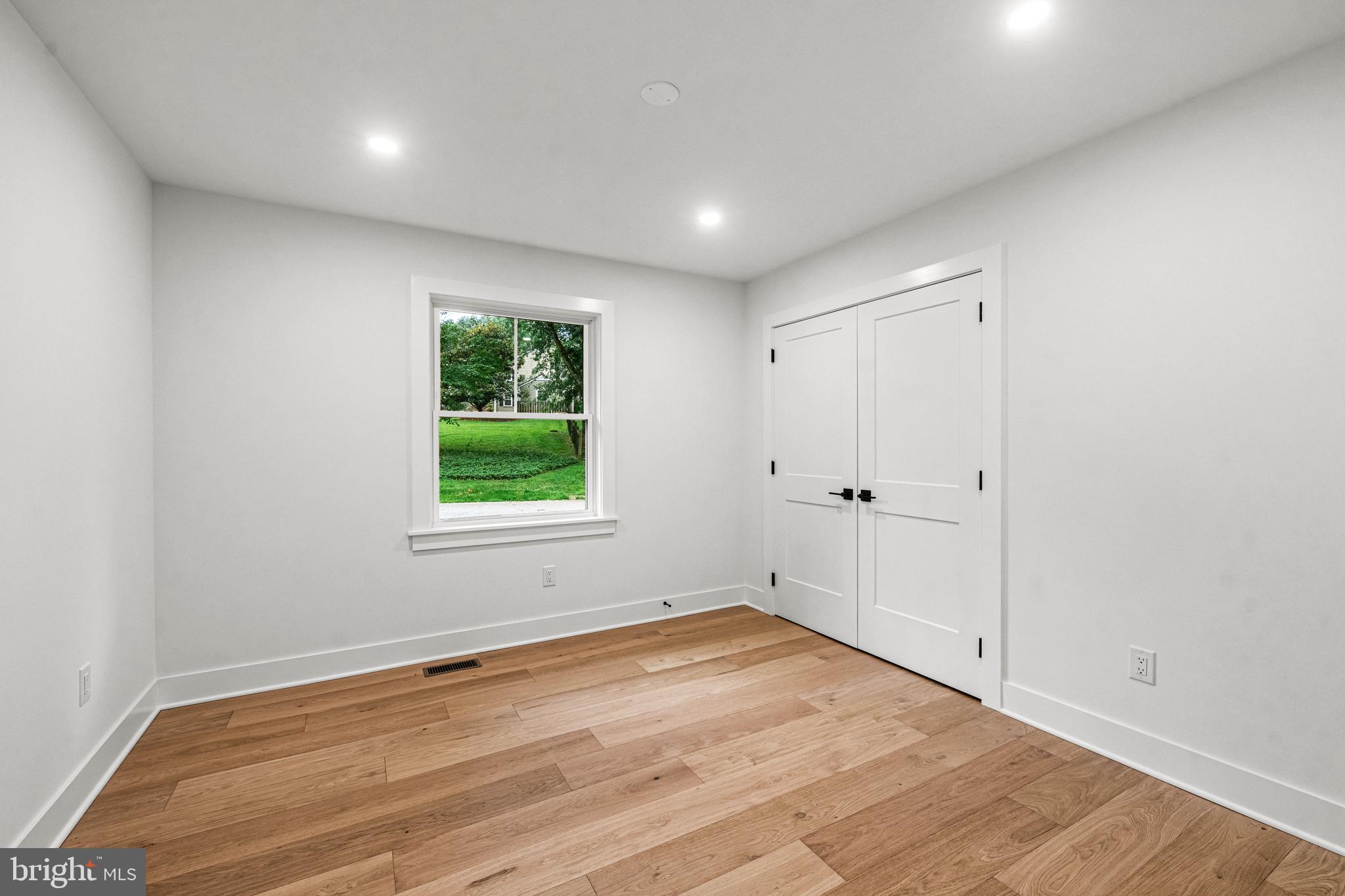 615 Cricklewood Road West Chester, PA 19382 - Photo 15 of 58 a view of empty room with wooden floor and fan