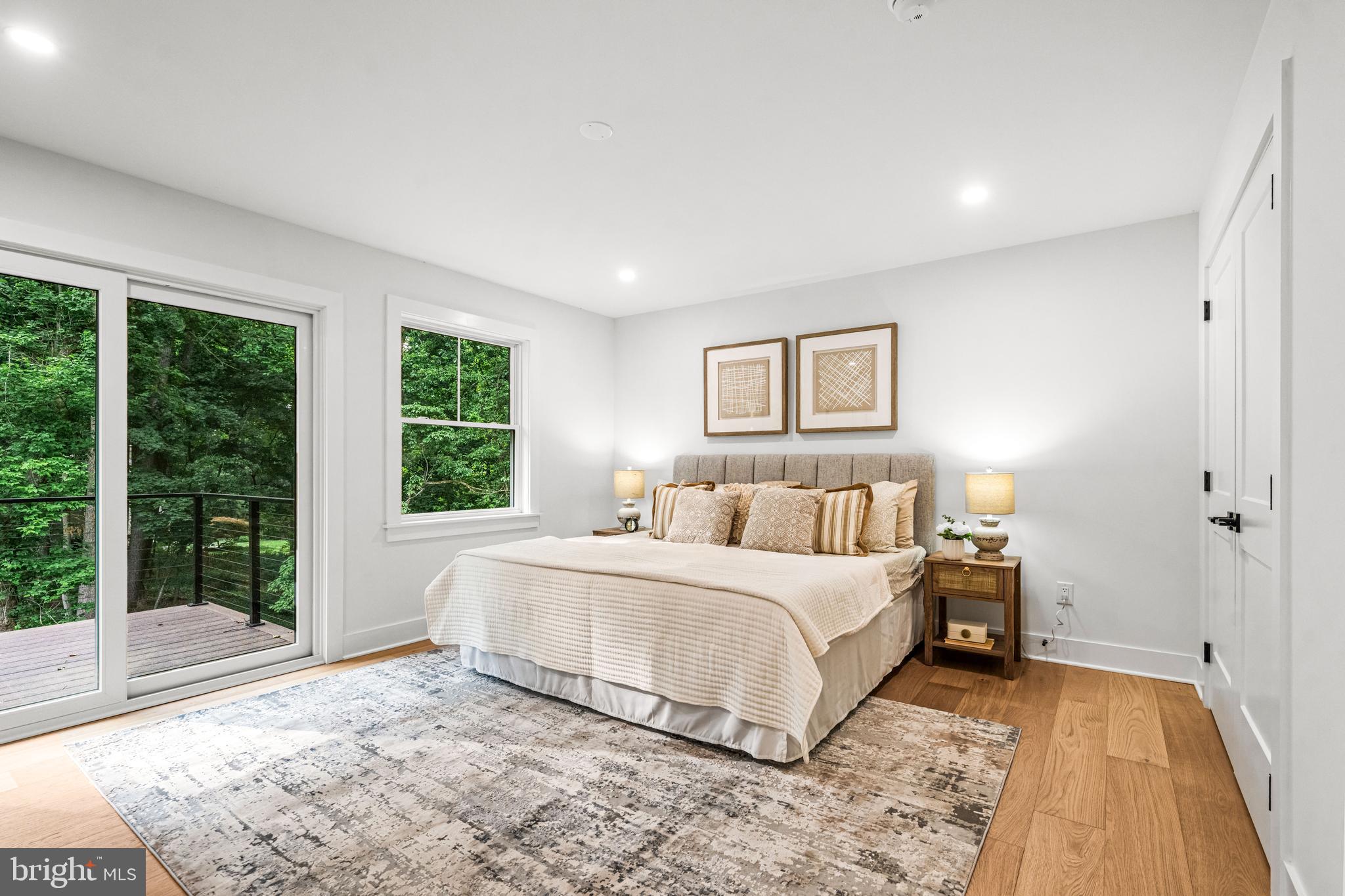 615 Cricklewood Road West Chester, PA 19382 - Photo 20 of 58 a bedroom with a large bed and a large window