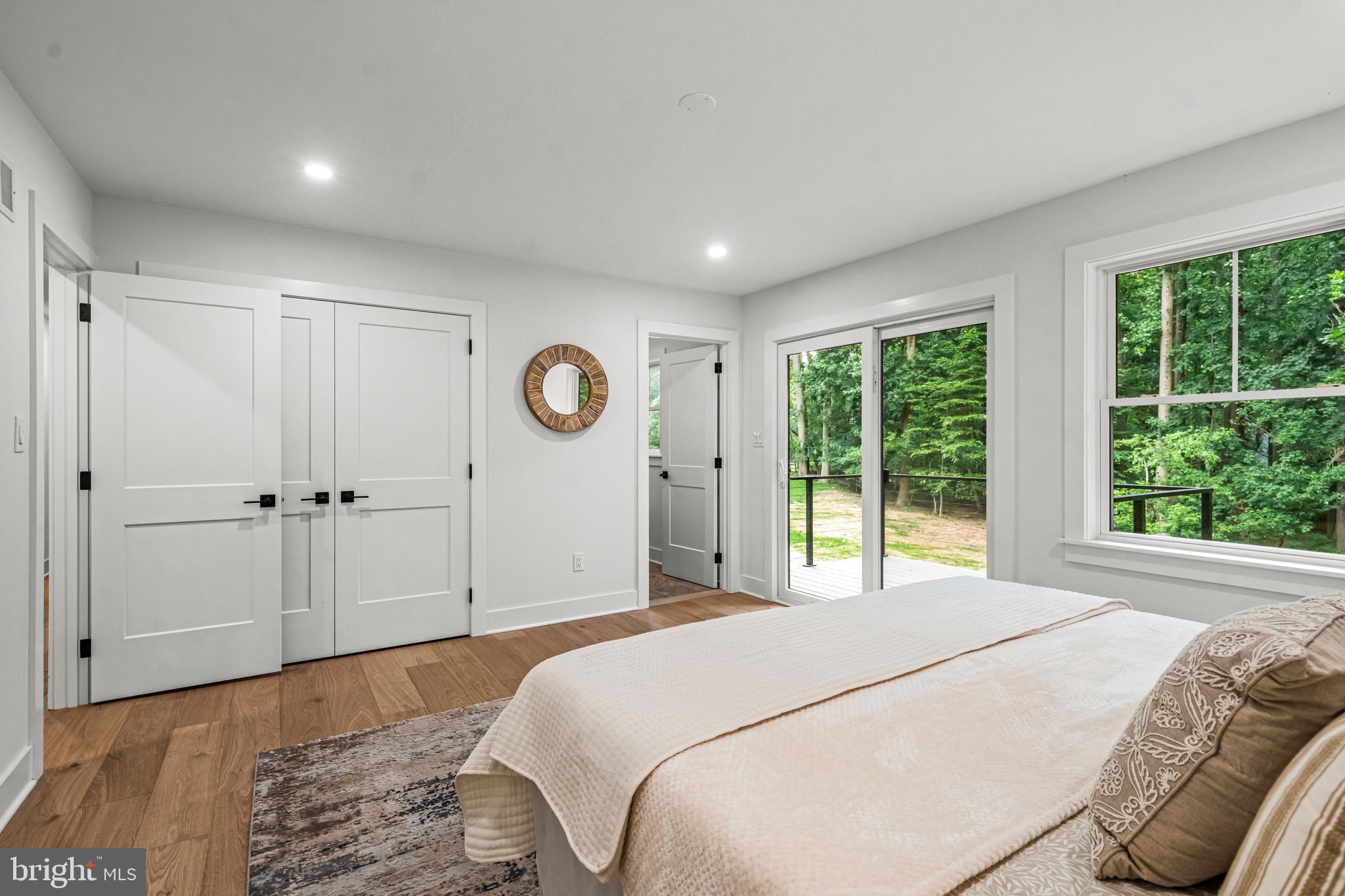 615 Cricklewood Road West Chester, PA 19382 - Photo 22 of 58 a bedroom with a bed and a large window
