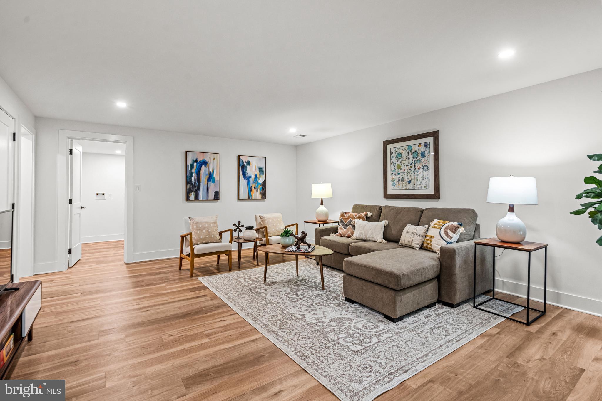 615 Cricklewood Road West Chester, PA 19382 - Photo 27 of 58 a living room with furniture and a rug