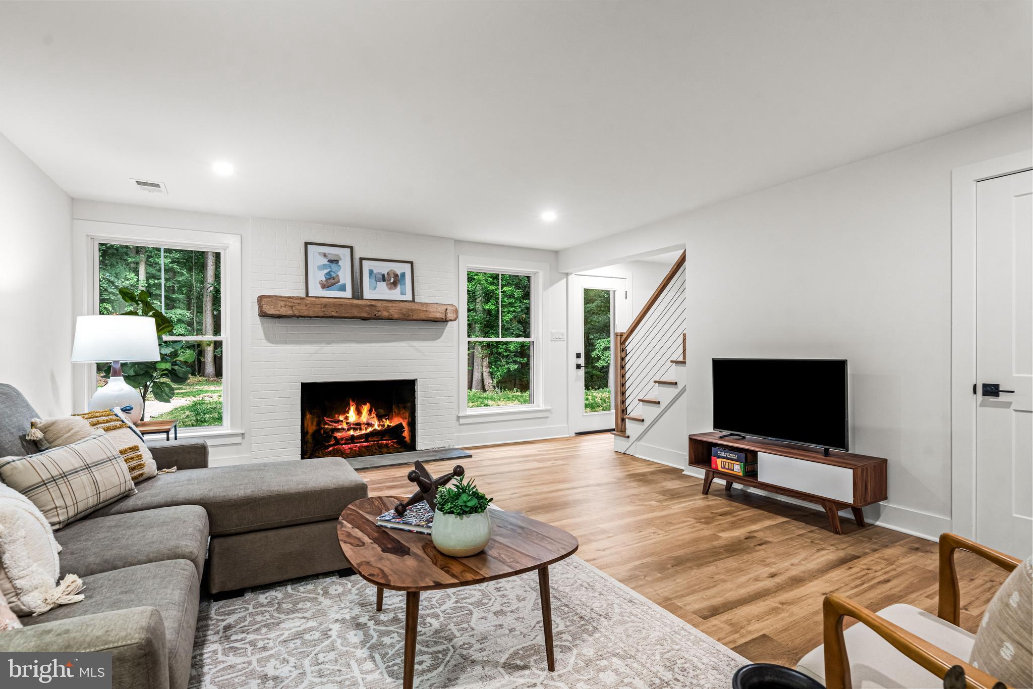 615 Cricklewood Road West Chester, PA 19382 - Photo 29 of 58 a living room with furniture and a fireplace