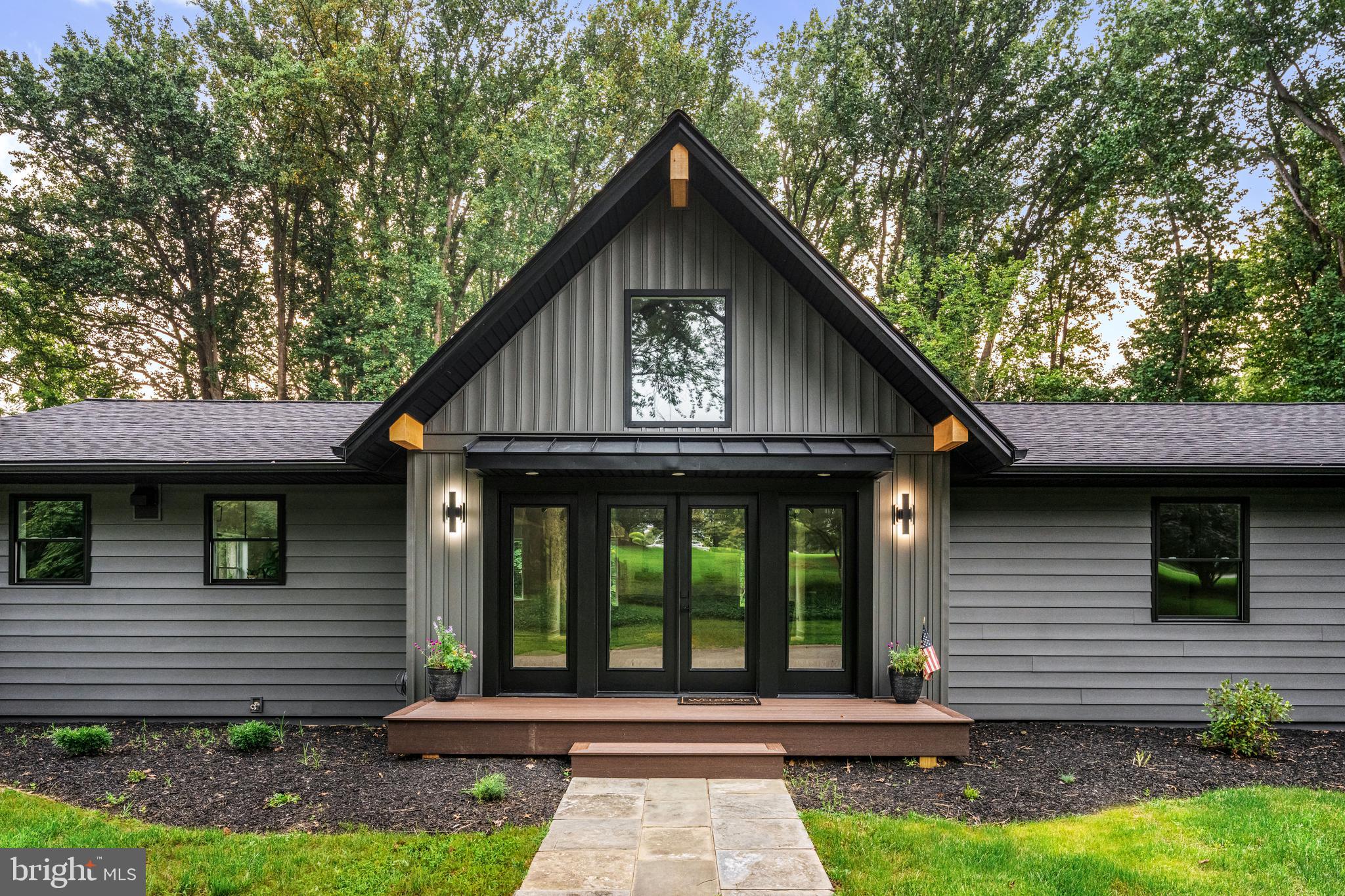 615 Cricklewood Road West Chester, PA 19382 - Photo 3 of 58 a front view of a house with a yard