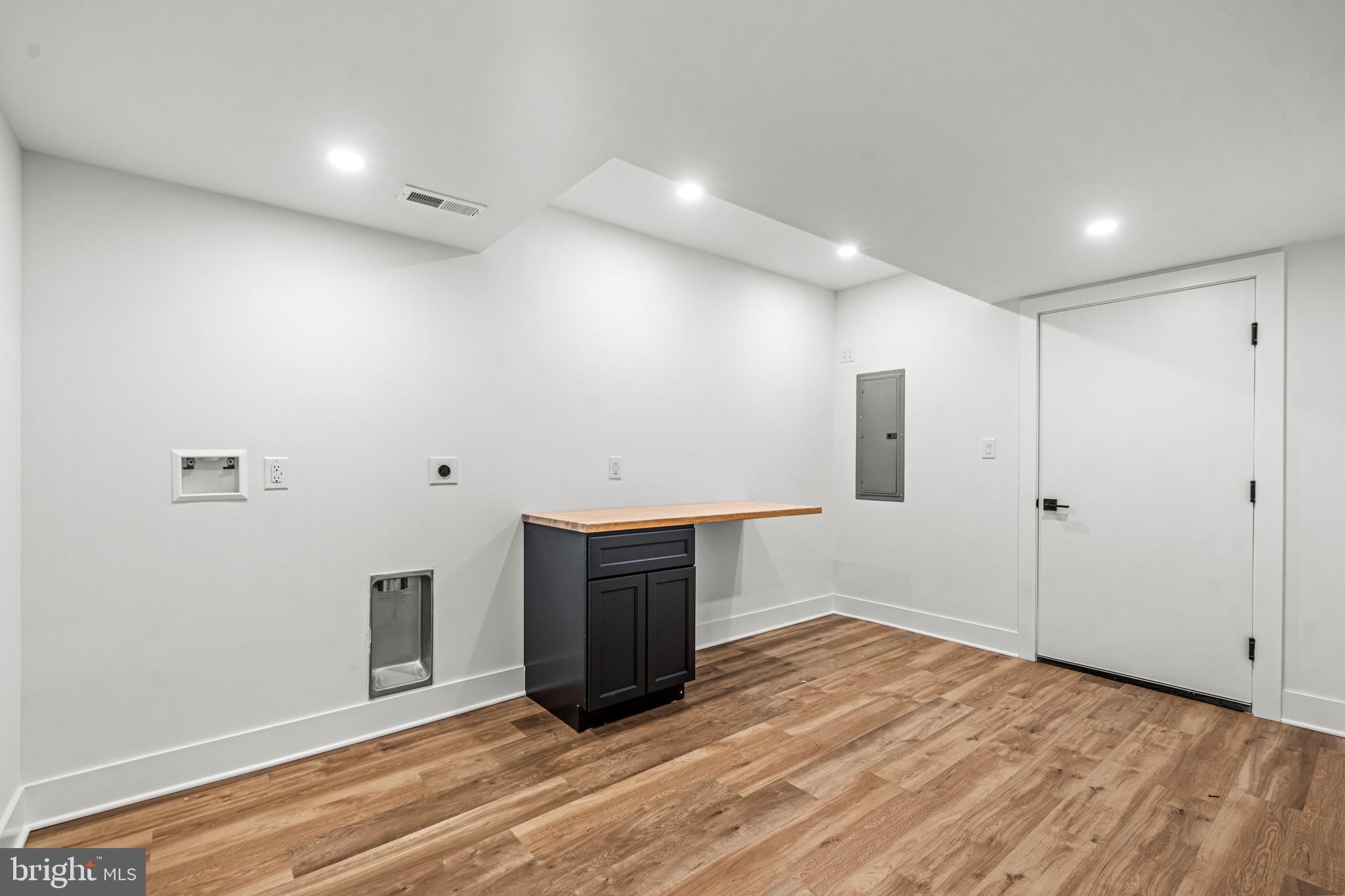 615 Cricklewood Road West Chester, PA 19382 - Photo 36 of 58 a view of an empty room with wooden floor and a window