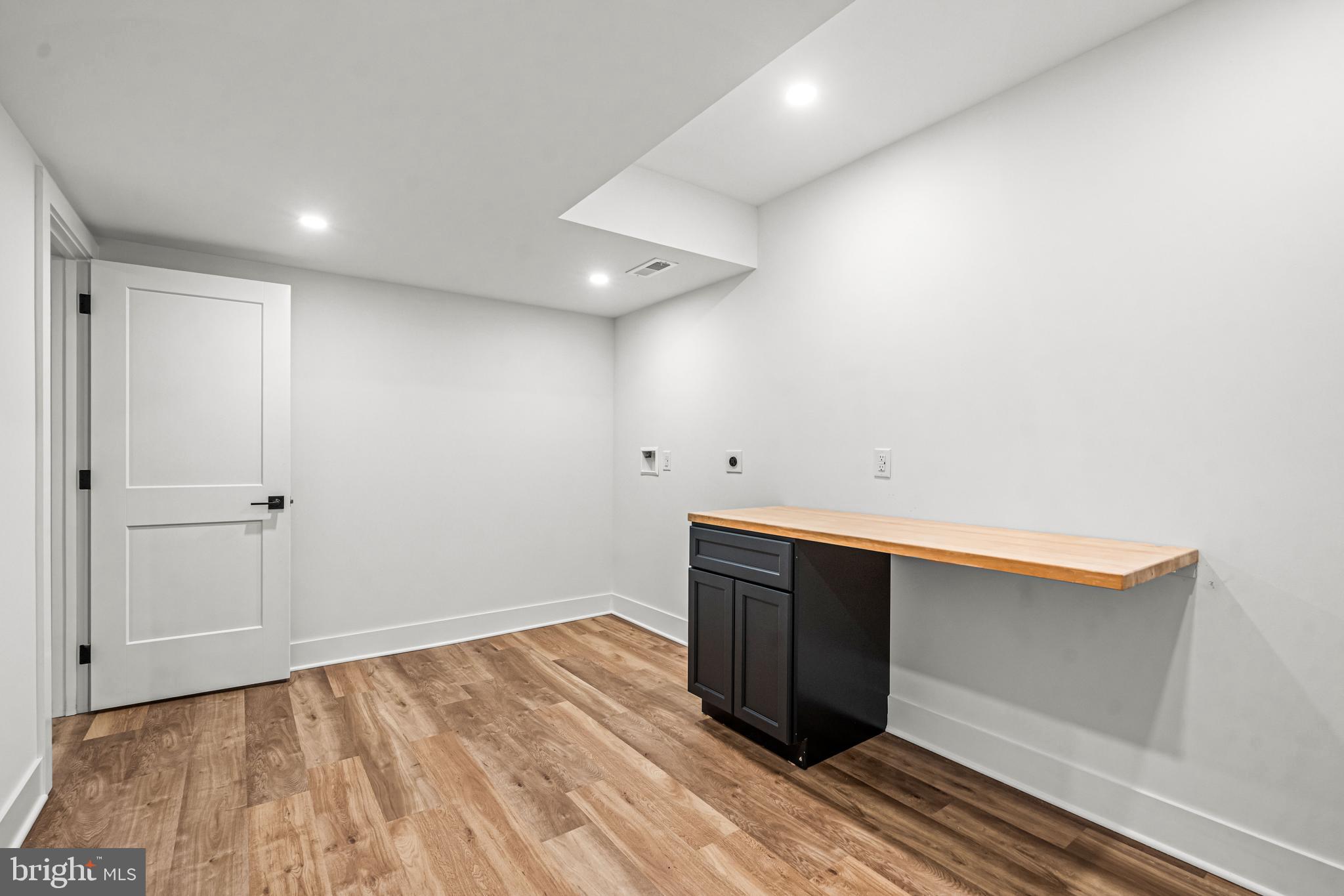 615 Cricklewood Road West Chester, PA 19382 - Photo 37 of 58 a room with wooden floor and white walls