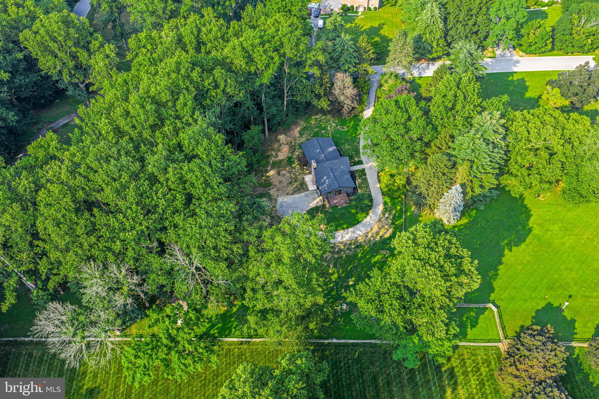 615 Cricklewood Road West Chester, PA 19382 - Photo 39 of 58 an aerial view of residential house with outdoor space and trees all around