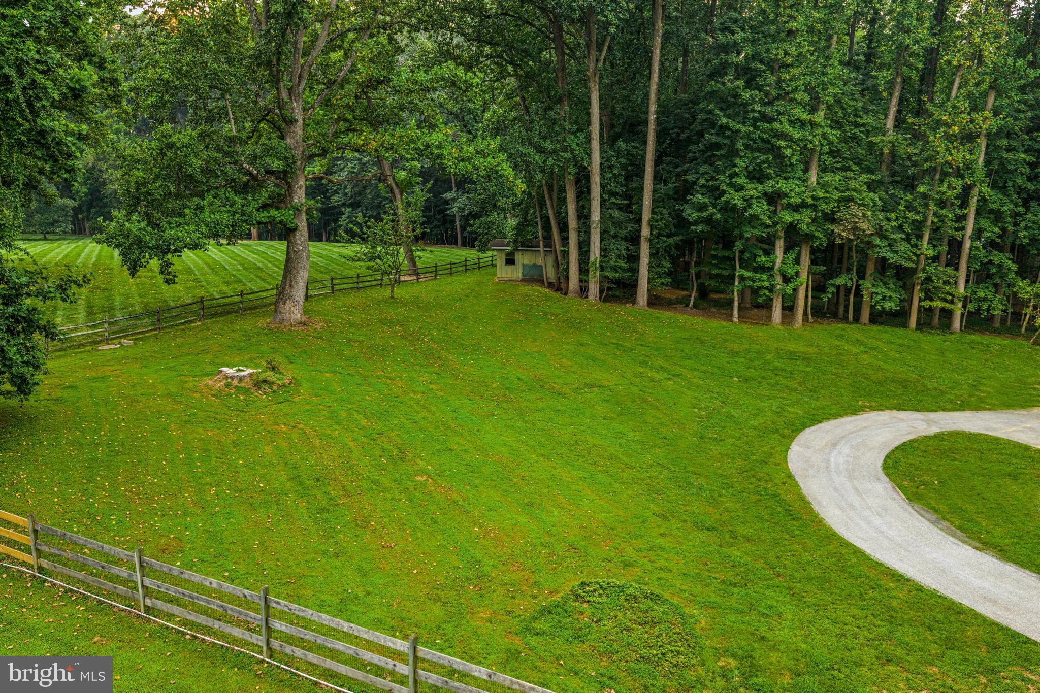615 Cricklewood Road West Chester, PA 19382 - Photo 40 of 58 a view of a backyard with a small cabin
