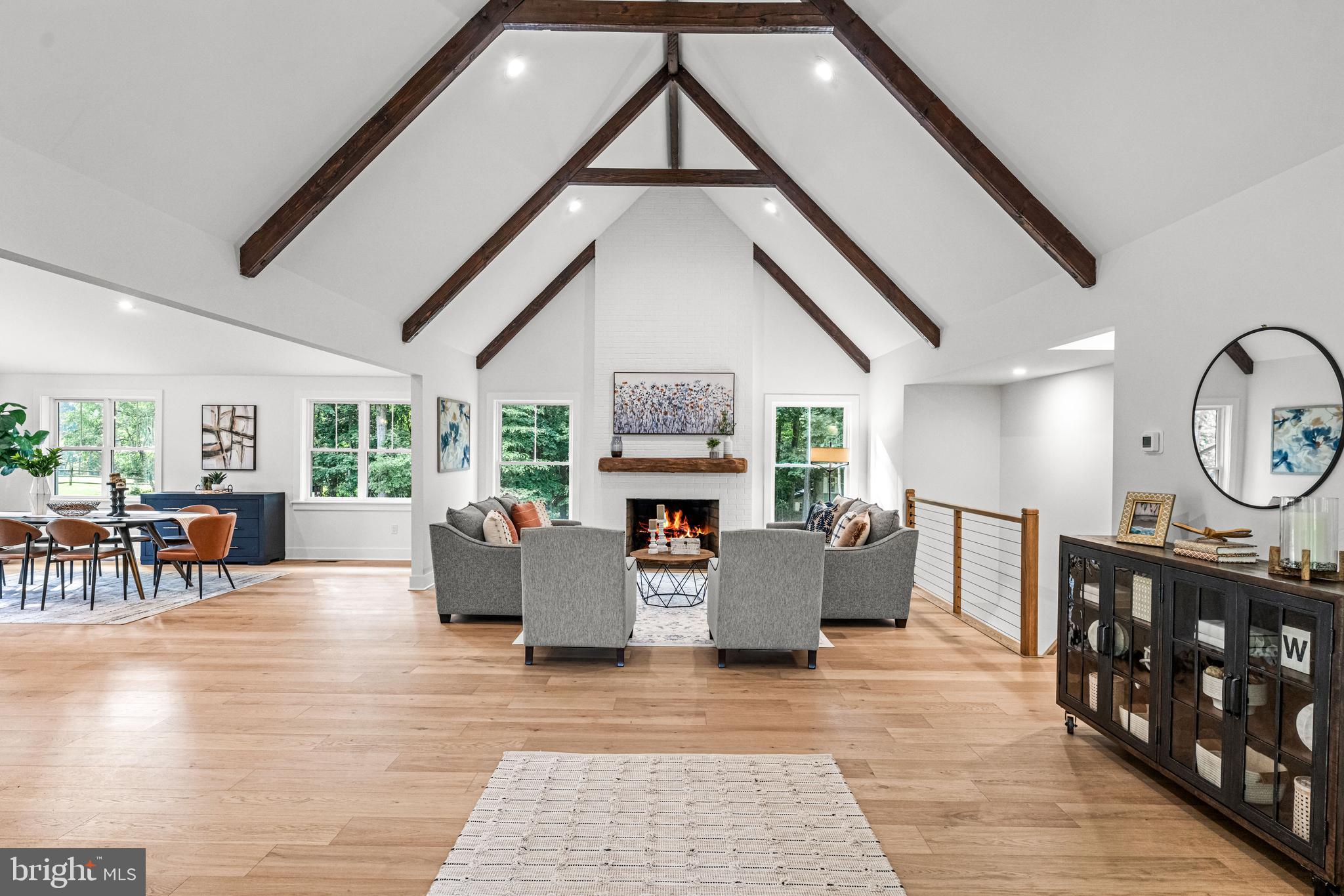615 Cricklewood Road West Chester, PA 19382 - Photo 4 of 58 a living room with fireplace furniture and a large window