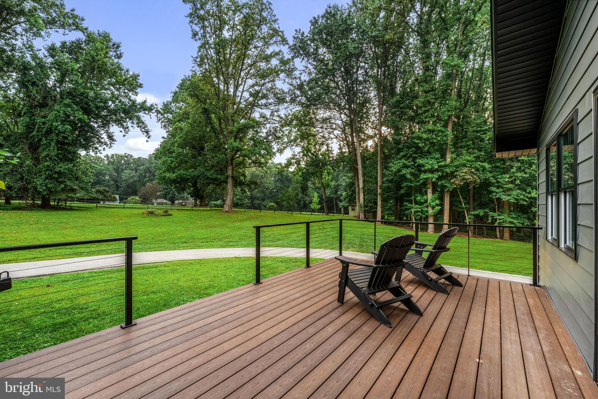 615 Cricklewood Road West Chester, PA 19382 - Photo 45 of 58 a view of a deck with chair and garden