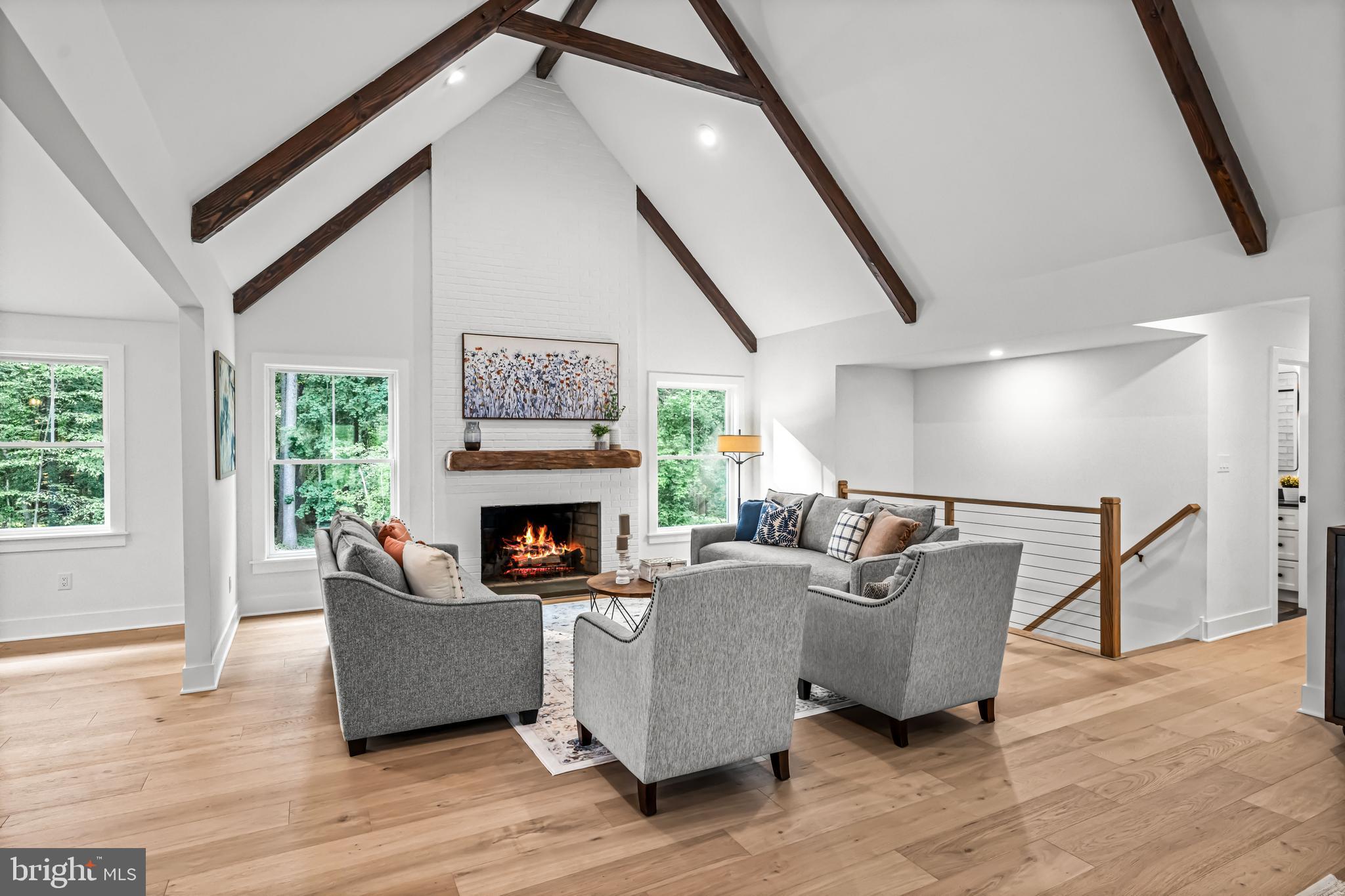 615 Cricklewood Road West Chester, PA 19382 - Photo 6 of 58 a living room with furniture and a fireplace
