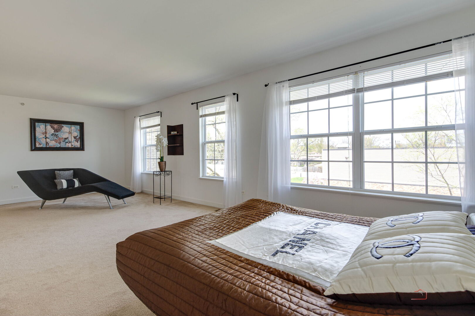 1330 Horizon Trail Wheeling, IL 60090 - Photo 24 of 39 a bedroom with a bed a couch and next to a window