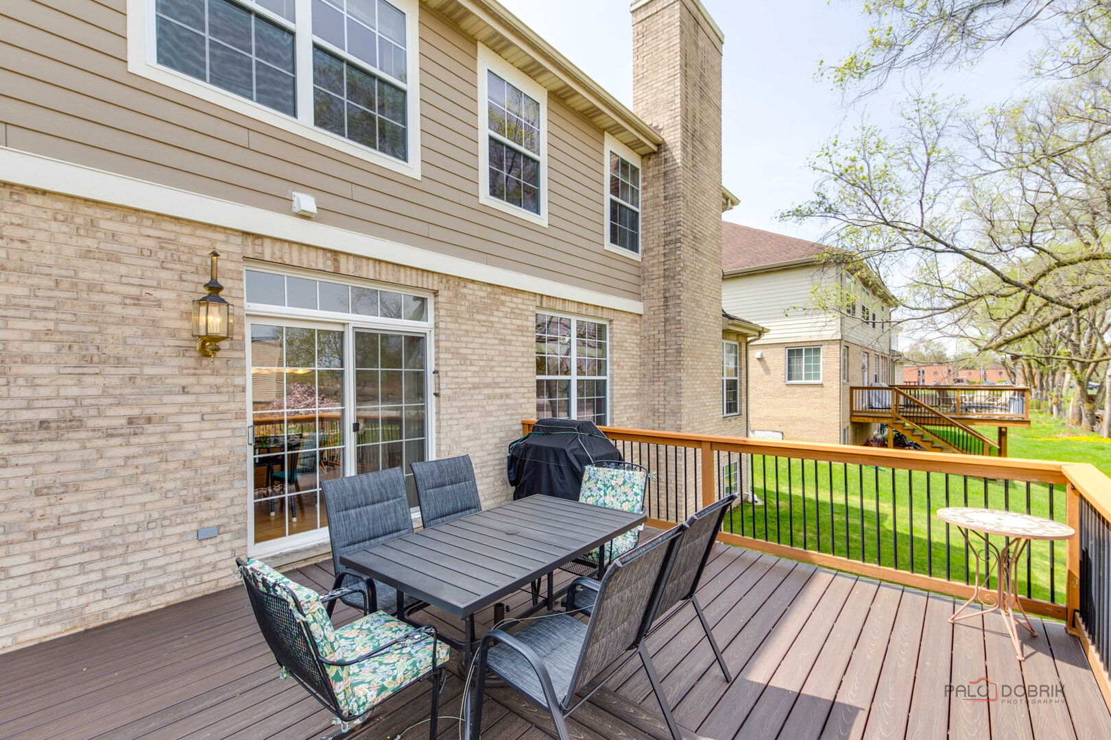 1330 Horizon Trail Wheeling, IL 60090 - Photo 36 of 39 a view of a deck with wooden floor and a lounge chair